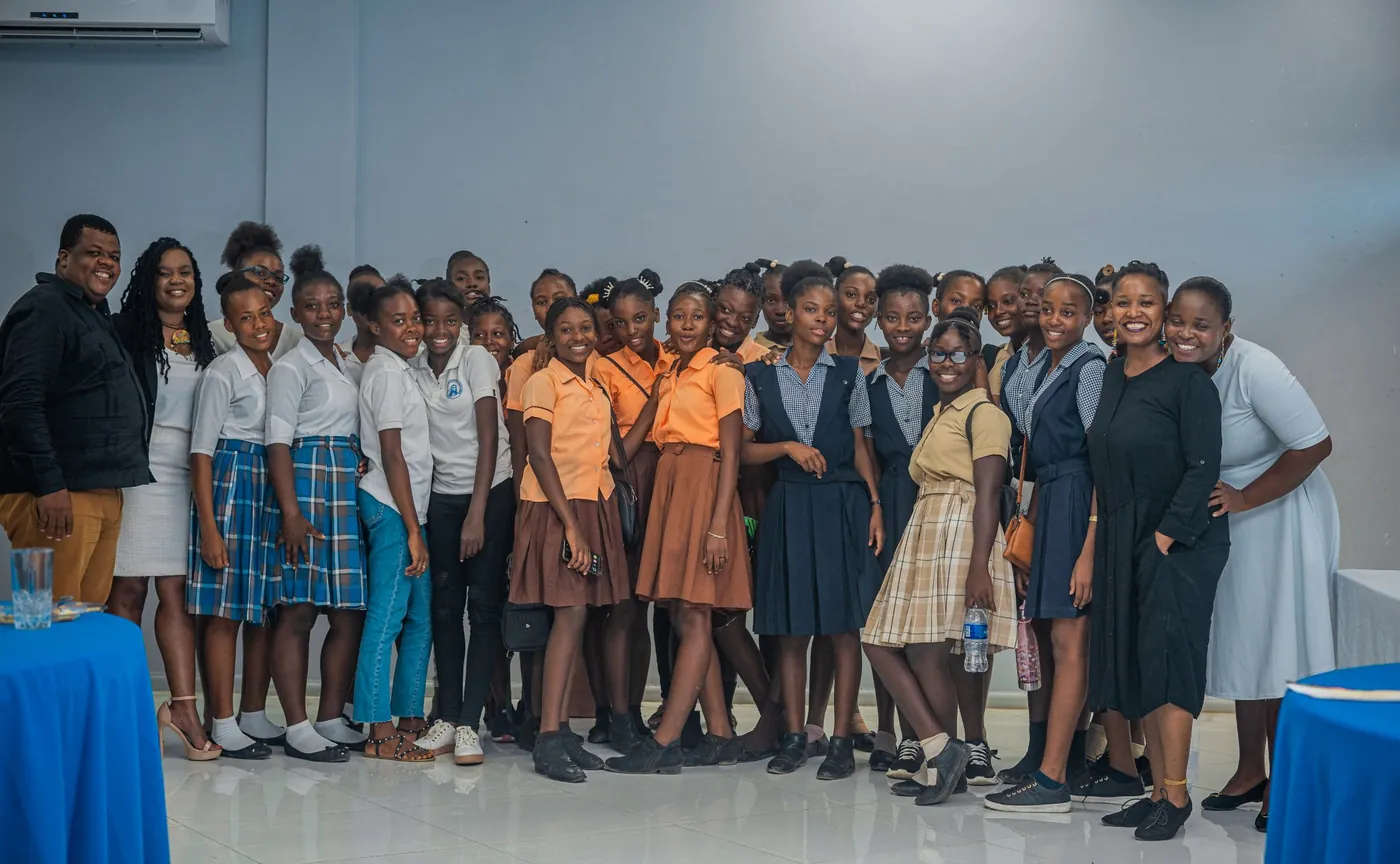 Scholarship recipients and their families in Chantal